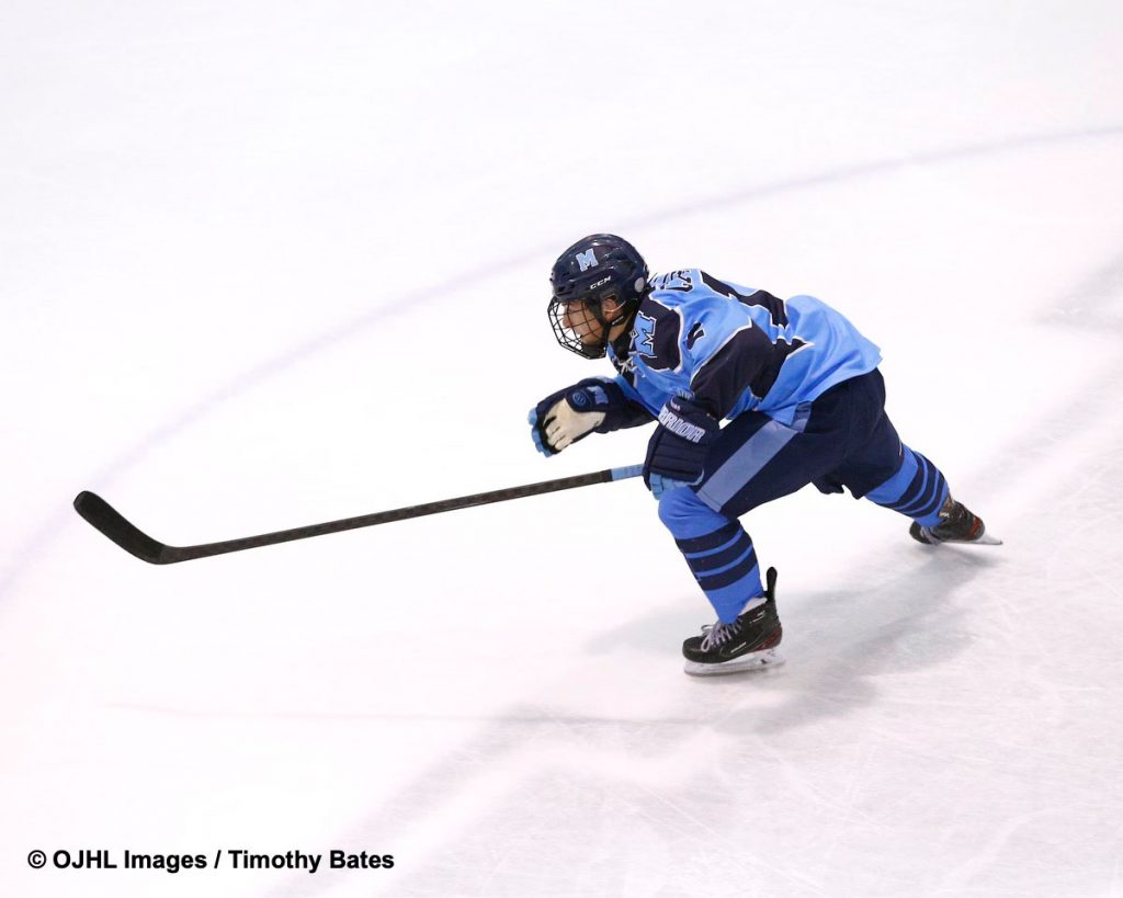 SMCS Grade 12 student-athlete Jared Coccimiglio playing hockey.